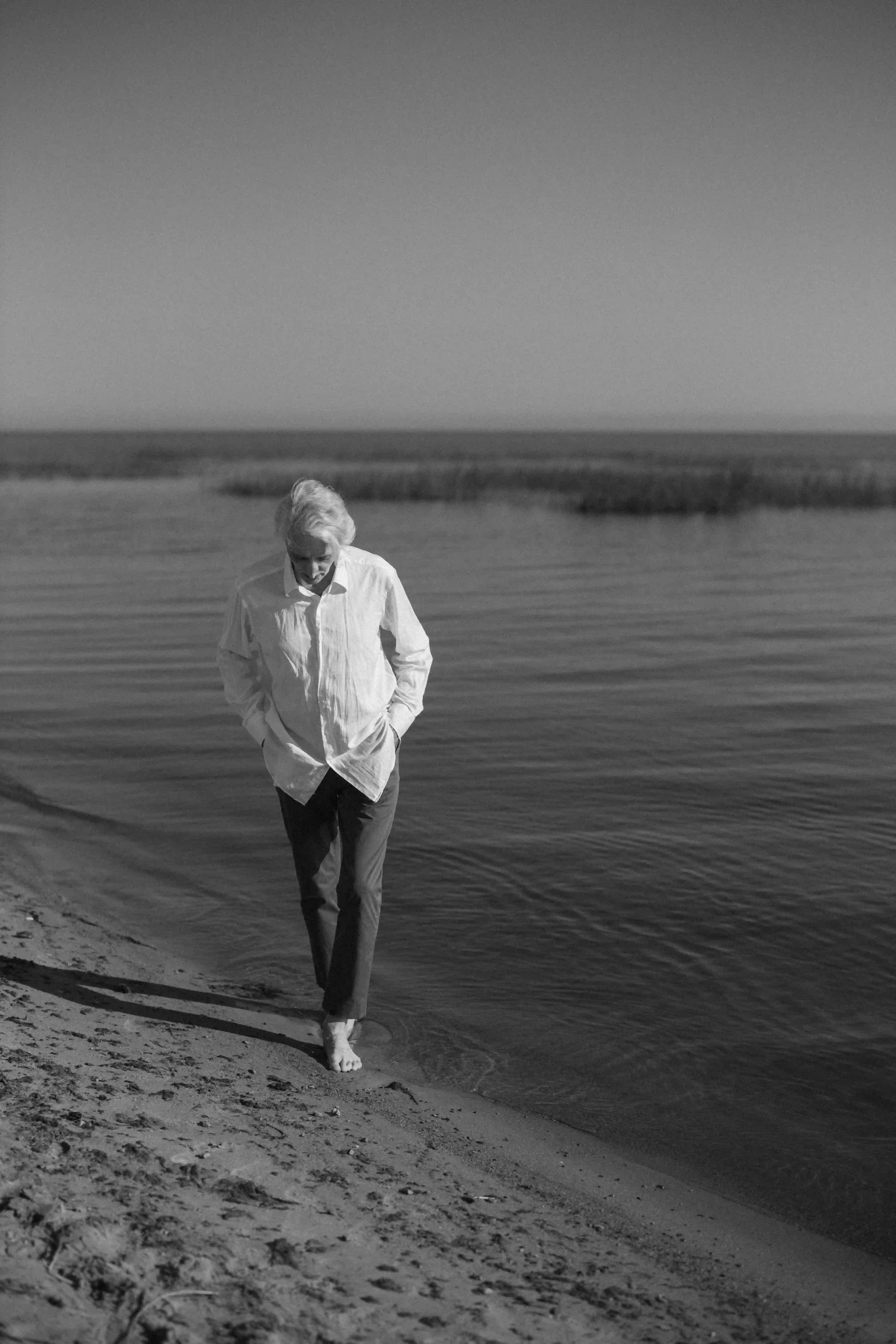Loneliness walker on the beach